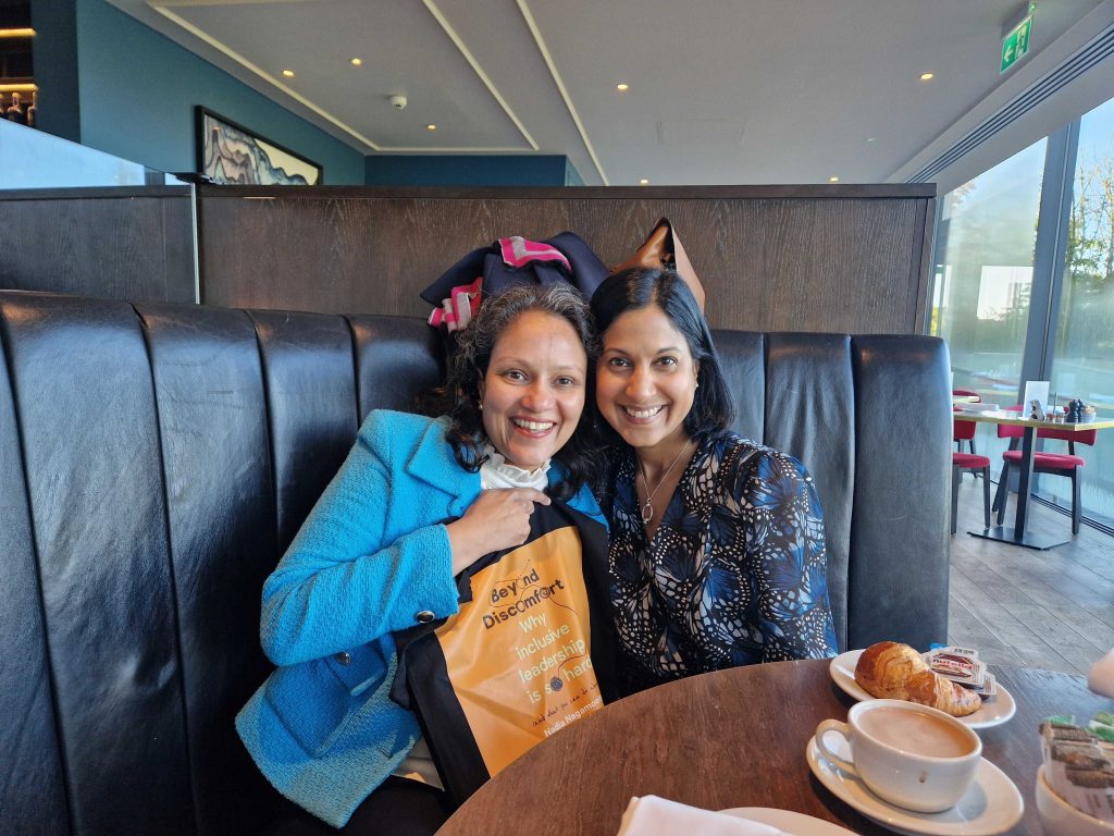 Two friends having breakfast together, celebrating a recent book publication